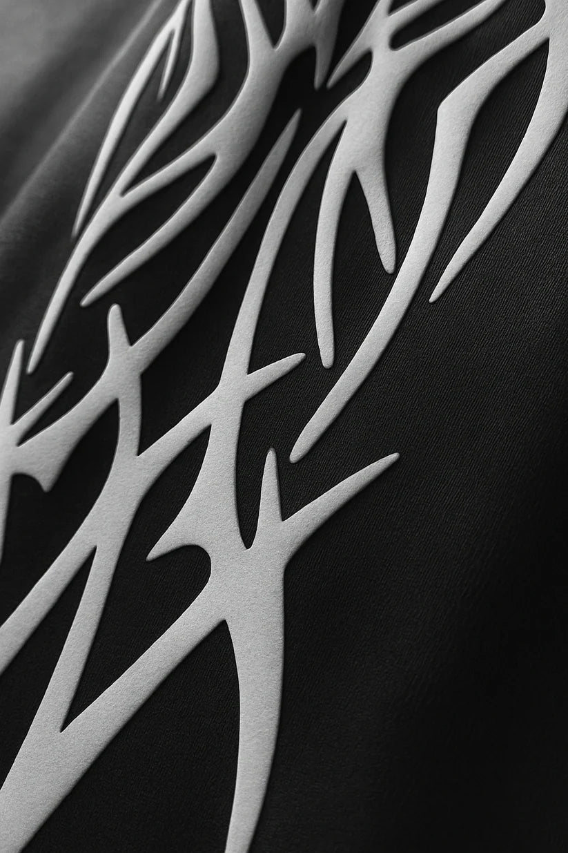 Close-up of tribal flame sleeve print on Balaclava Hoodie