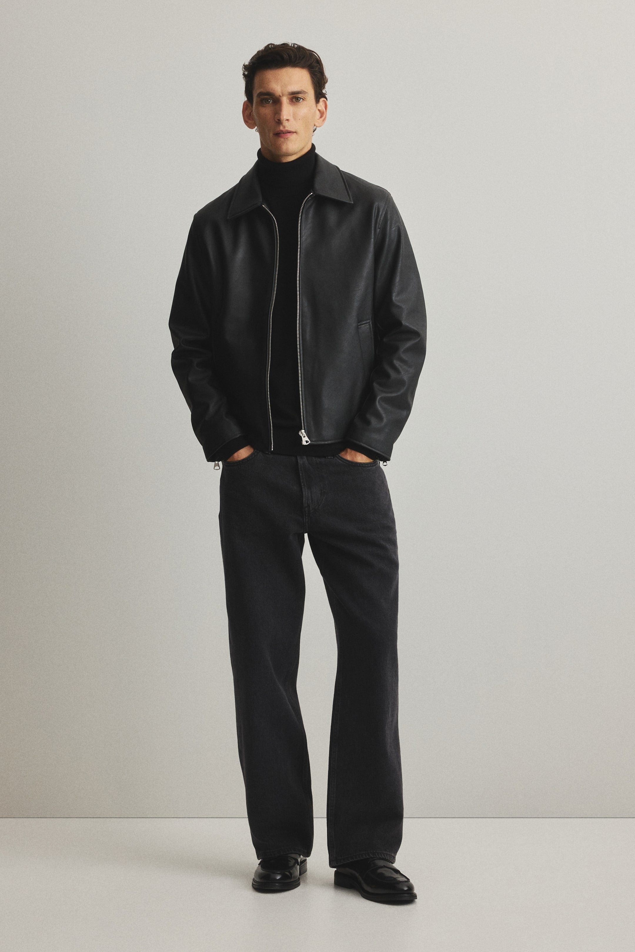 Black boxy leather jacket close-up India – premium PU leather texture zipper detail | LZRUS