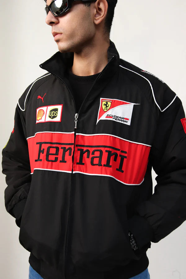 Zipper and fabric detail on embroidered black Ferrari jacket