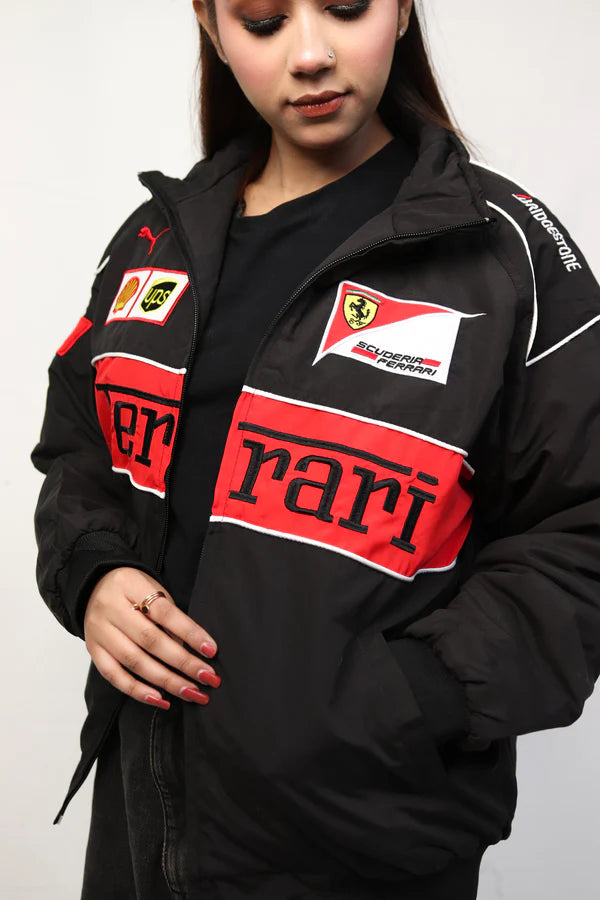 Flat lay of black Ferrari embroidered bomber jacket streetwear