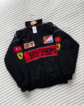 Front view of LZRUS Embroidered Black Ferrari Jacket Unisex with various logos on a textured white background