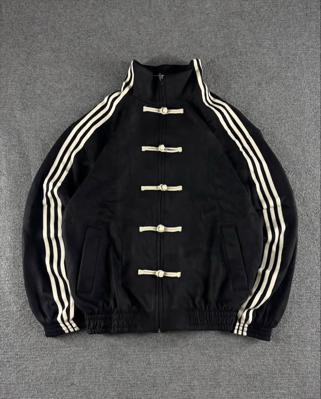 Black CNY Jacket by LZRUS – front flat lay view showing premium 420 GSM vegan suede fabric and Chinese knot button closure | India