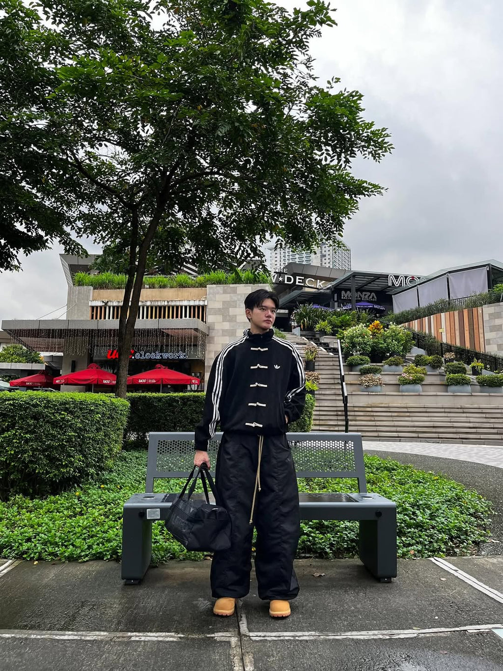 Black CNY Jacket men styling – LZRUS Black Knot Jacket worn with streetwear cargo pants | Black Chinese New Year Jacket for men India