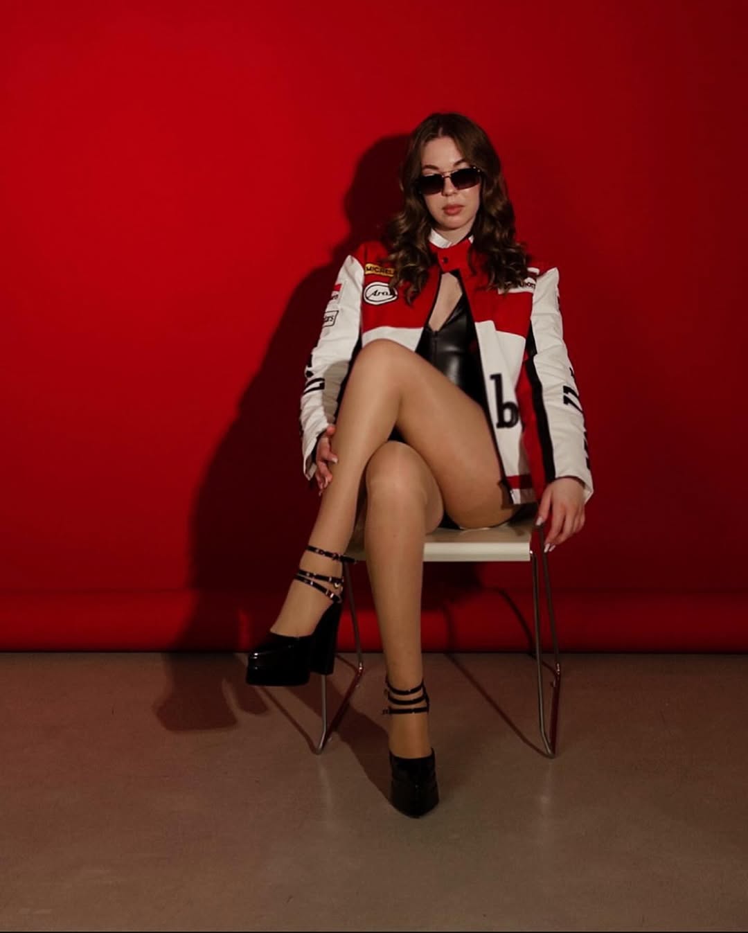 Women’s biker racing leather jacket – premium vintage Marlboro design, styled with sunglasses