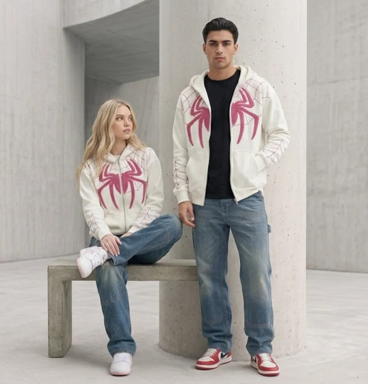 Couple wearing matching white Spiderman embroidered hoodies with pink chenille spider, oversized unisex streetwear LZRUS