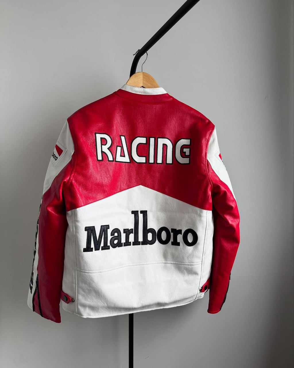 Back view of LZRUS Marlboro motorsport leather jacket with Racing text and Marlboro branding in premium PU leather