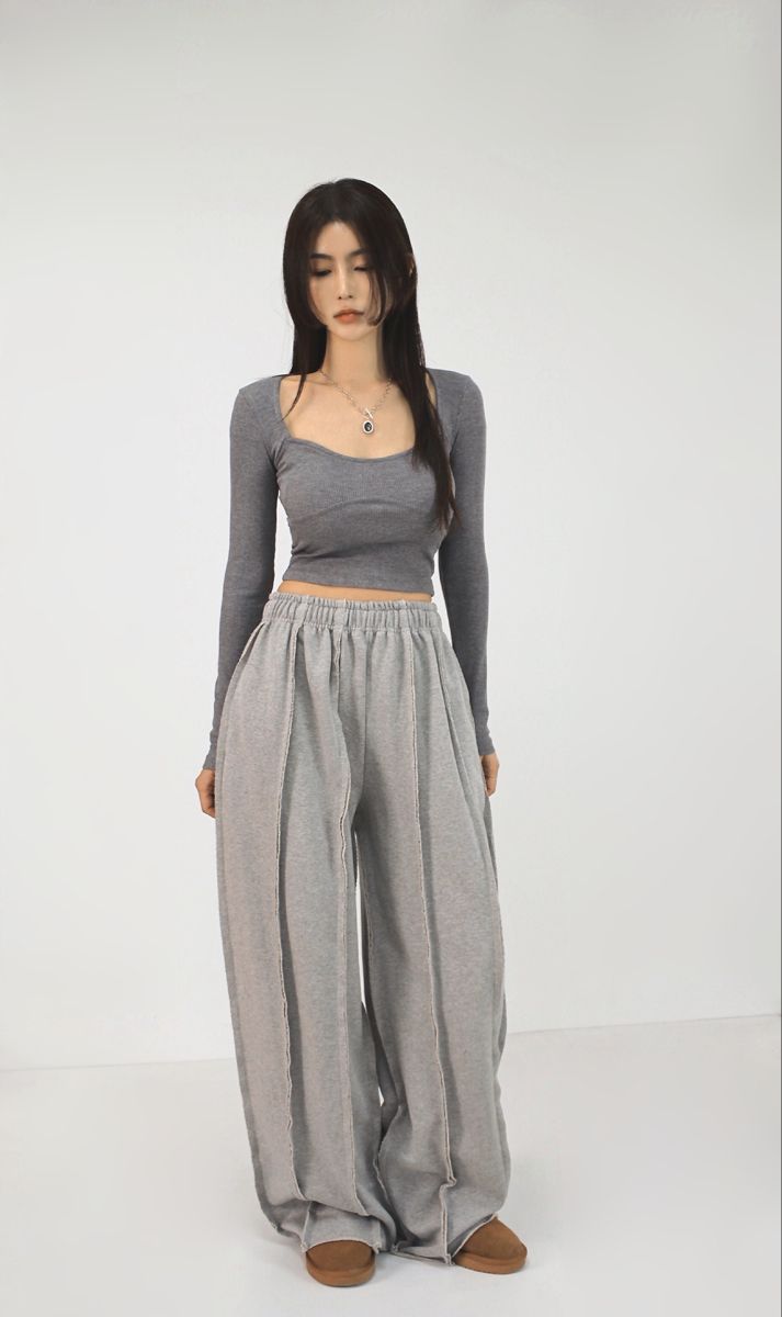 LZRUS unisex grey exposed seam sweatpants – women front full body view with visible vertical seam lines, wide leg fit, deconstructed streetwear India